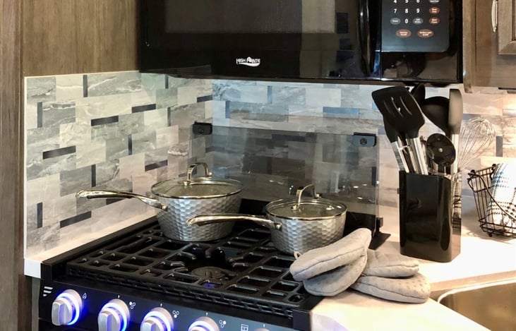 Kitchen comes with everything you need: Pots, pans, cooking utensils, and more.