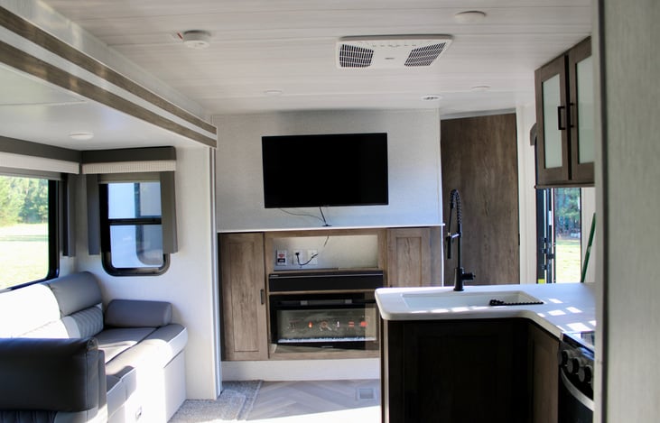 TV and fireplace in living area