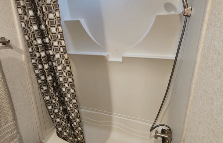 large shower, lots of hot water