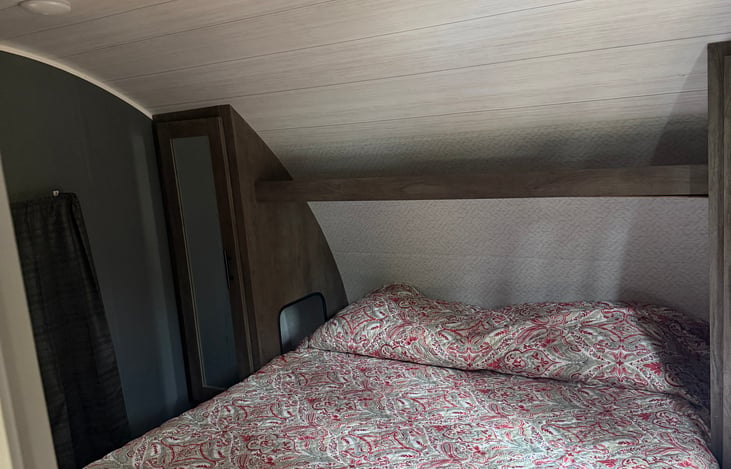 Private bedroom with queen bed.
