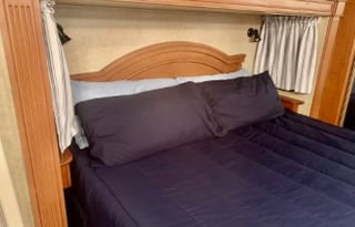 A 5th wheel travel trailer suited for 2 people