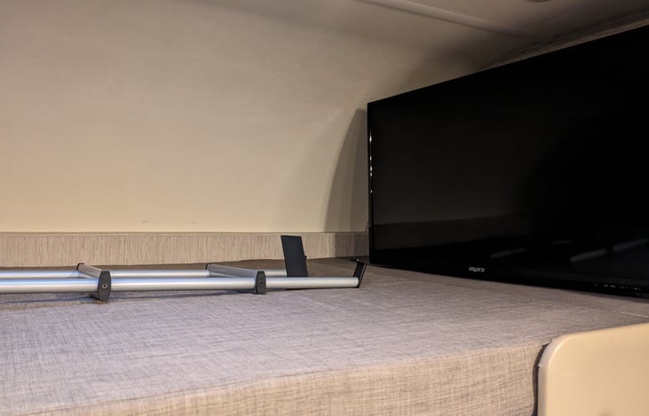 Queen size above can bed. Smart TV.