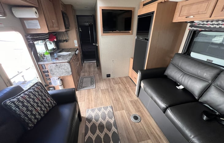 Great sitting area in the living room with 2 couches!  A table can be installed easily in the floor to accommodate meal time too!
