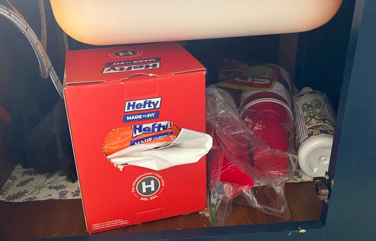 STOCKED GARBAGE BAGS AND SOLO CUPS
