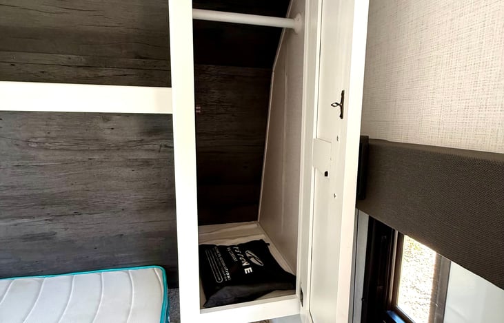 Small but practical closet—perfect for hanging clothes, storing jackets, or keeping your camping wardrobe organized.