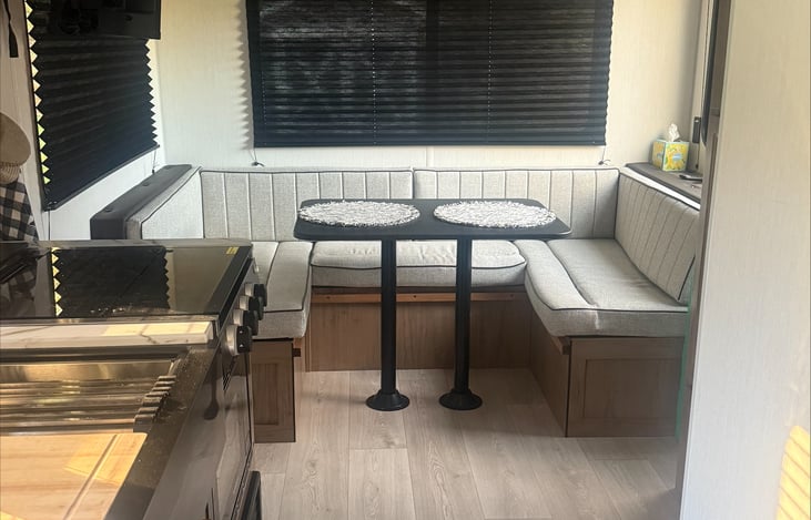 Large U shaped dining that converts to sleeping area