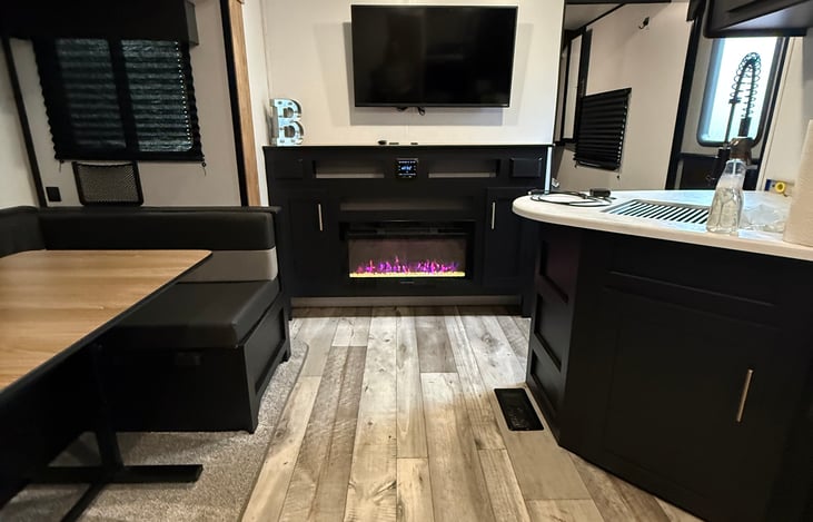 Entertainment area with Electric Fire Place.
TV Not included in rental.