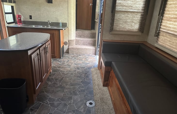 Spaciousness Kitchen furnished with essentials. Just bring the food!  Custom seating that will add comfort to many.