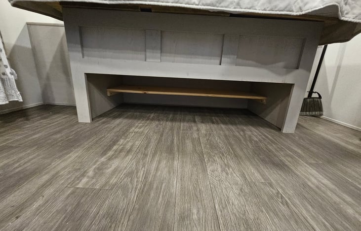 Built-in shoe rack under the bed — a small detail that makes a big difference