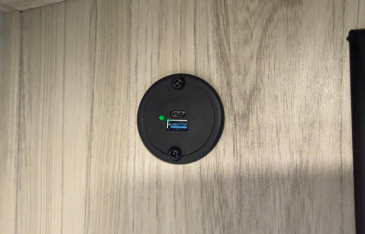 USB's and USB-C's throughout. They run off of the RV batteries. No need to be plugged into Shorepower.