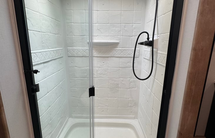 Sliding glass door shower