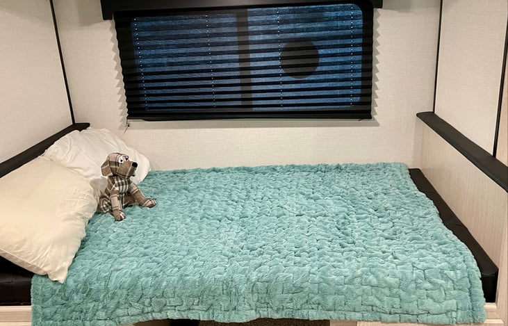 The dinette converts into a comfortable bed for two children and sleeps one adult easily.