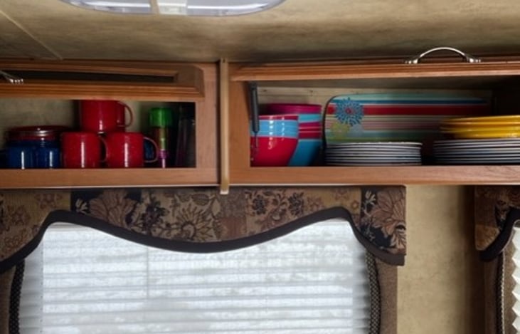 Just a view of the dinner ware in trailer.