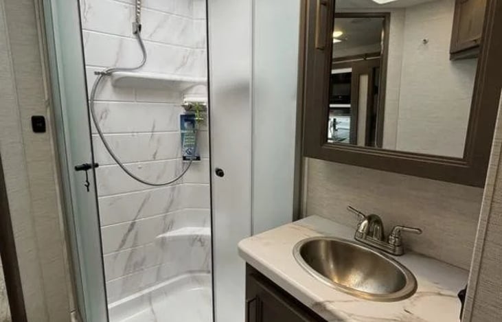 Love the walkthrough bathroom.  Bathroom will be stocked with enough towels and toilet paper for all guests.