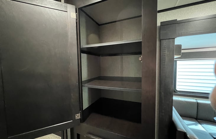 Large pantry for extra food items or gear storage