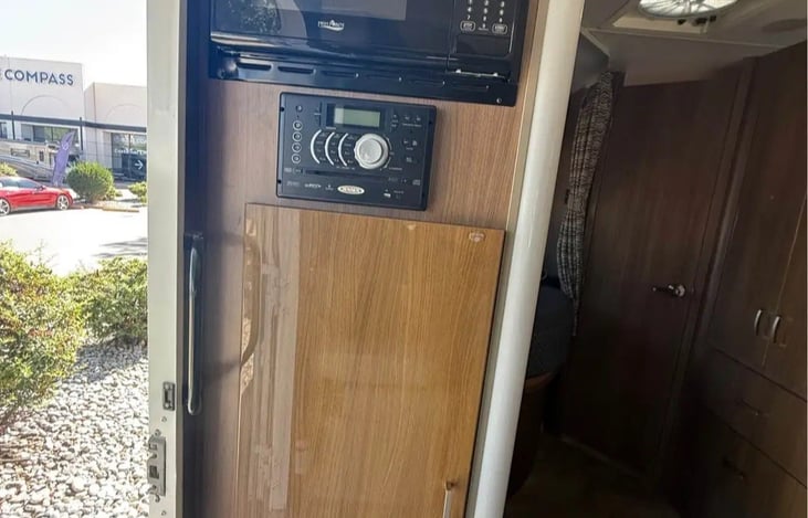 microwave and radio/dvd player for TV. RV has 3 different speaker systems. Rear, front and outside.