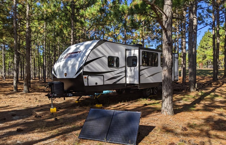 Renogy 200 Watt 12 Volt Portable Solar Panel with Waterproof 20A Charger Controller to charge quickly 100Ah AGM battery for primitive camping.