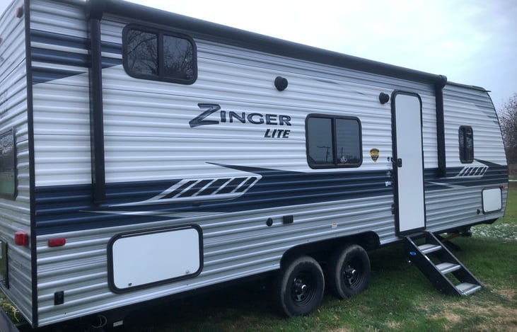 Side view with entrance door of Camper