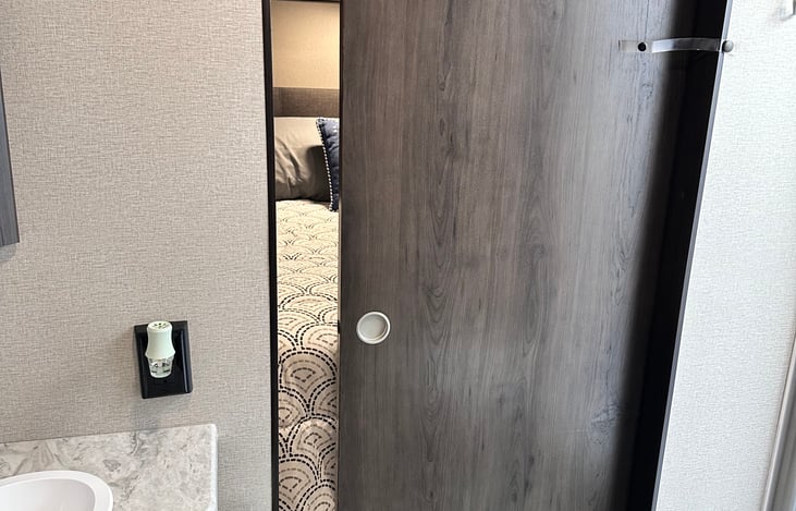 There is no lock on the sliding door to the bedroom