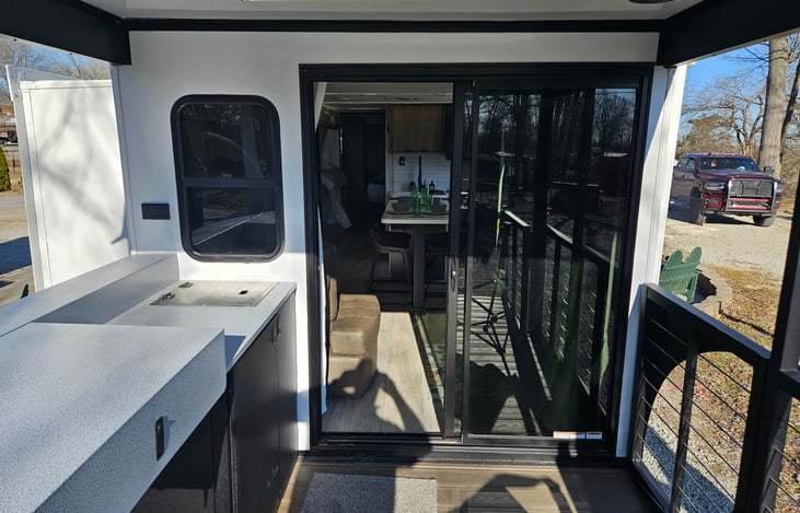 Sliding door between porch and living area