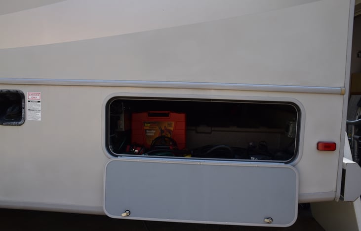 Heavy duty jumper cables.
Battery charger
Trickle charger
50 AMP adapter
Surge protector
Extention cords
Coax cable