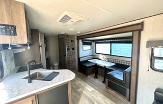 Fully furnished travel trailer for a small family.