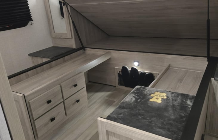 Under bed storage in front bedroom