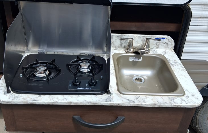 Outside kitchen with refrigerator