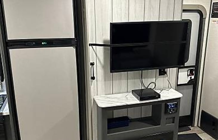 Fridge, Pantry, 32” Smart TV, DVD Player, and Fireplace