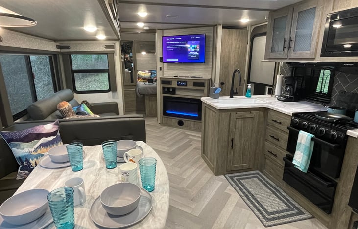 Raining?  Make some coffee and watch a movie next to the fireplace or gather around the table for some games