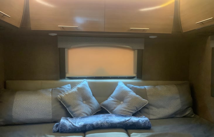 The very rear features two  twin beds. Including storage below. If you would like a little more sleeping space, the twin beds will convert to a king size bed.