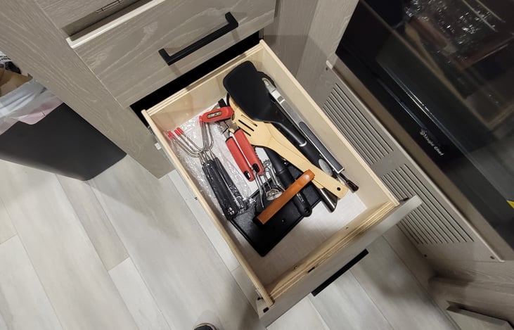 Utensils, including spatulas and spoons needed for your culinary needs.