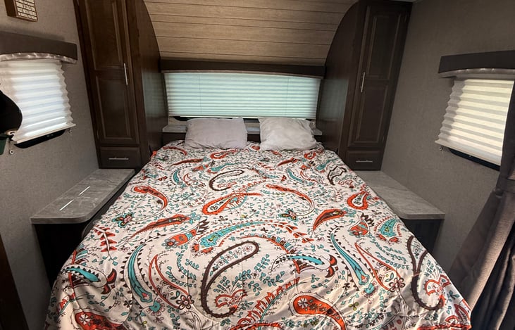 Sofa lays flat and queen size bed comes down over the top of sofa.
