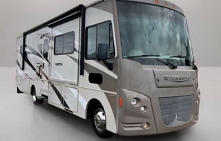 Class A Winnebago drives easy, sleeps 5