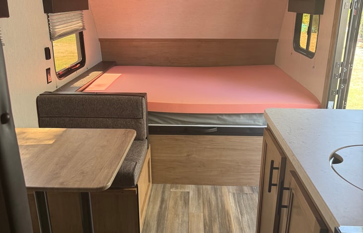 RV Size Queen with Foam Topper for added comfort. Bed lifts for additional storage.