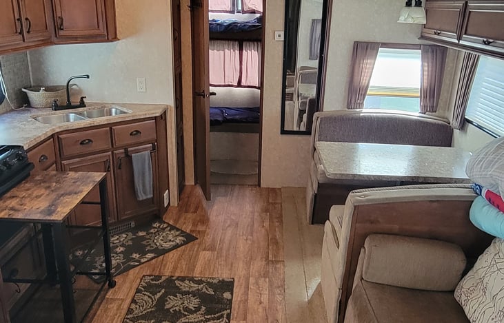 Feel free to use towels, blankets, utensils,  and cleaning supplies. If its in the camper you can use it.
Nice size fridge with an additional microwave