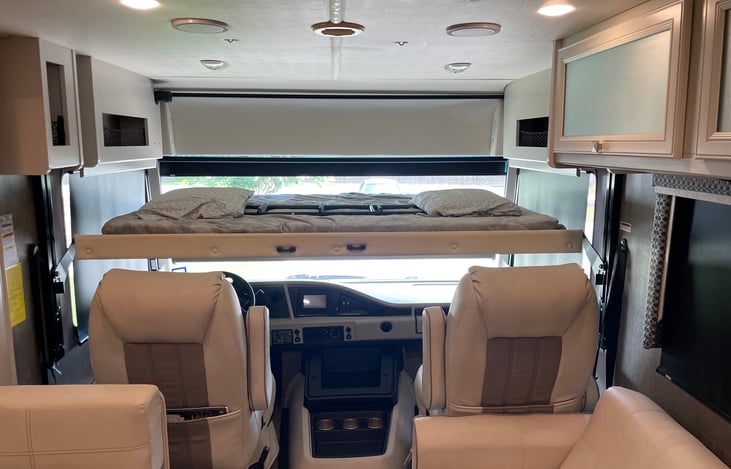 Need extra sleeping space? The convenient drop-down Murphy bed comfortably sleeps two without sacrificing living space during the day