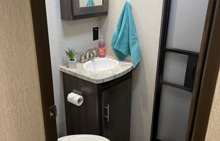 Back half bathroom and second entrance