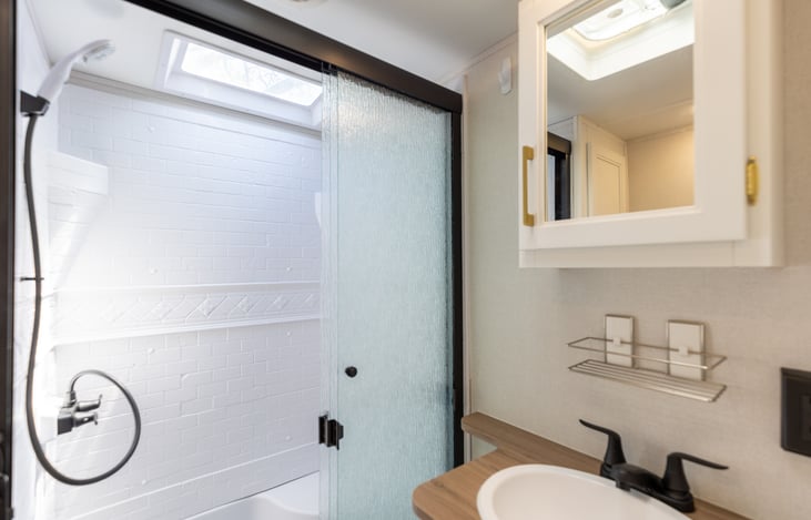 Bathroom with large walk in shower.