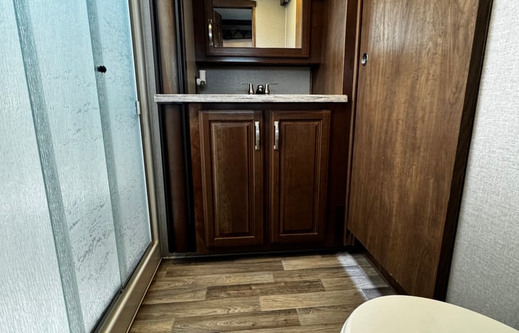 Nice size bathroom with complementary hygiene products.