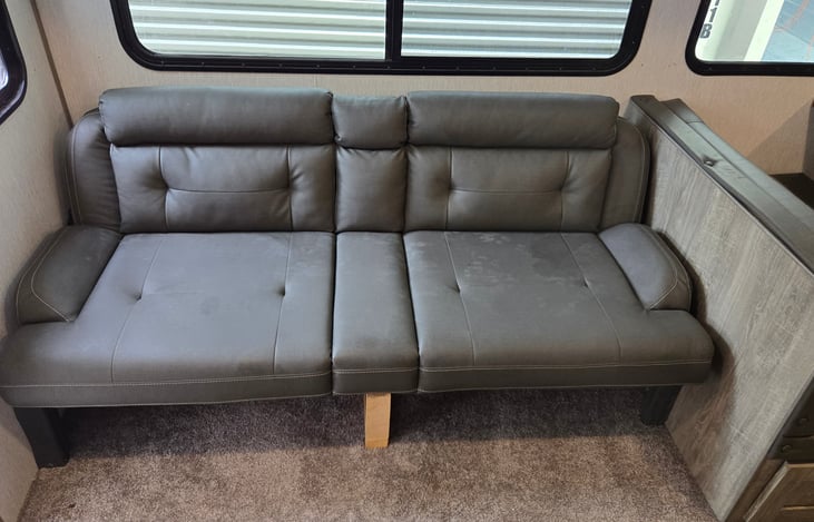 Replaced old dual sofa with a new jackknife sofa which now can be used as a bed for two people.