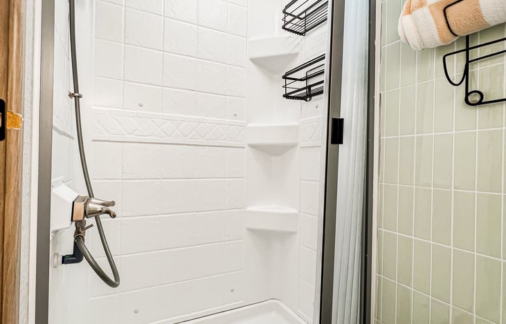 Shower with tankless water heater to save water