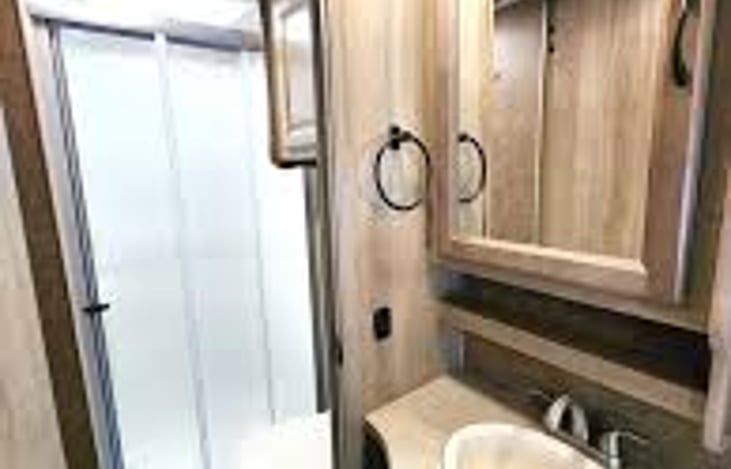 Bathroom. Shower and Toilet behind door for privacy