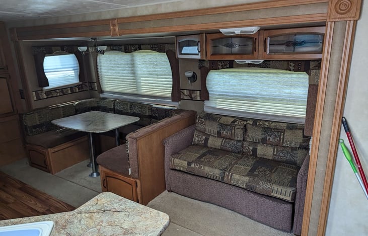 Living room with storage and pull out bed