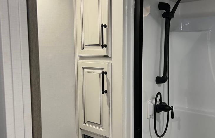 Bathroom has loads of storage