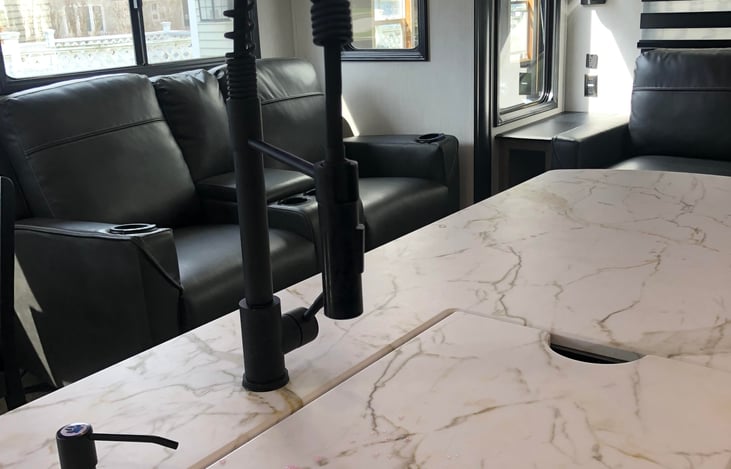 Cover for sink allows for extra food prep space