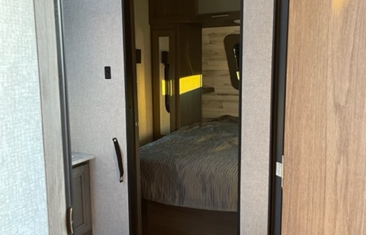 Queen bedroom has 2 entrances, through the bathroom or hallway