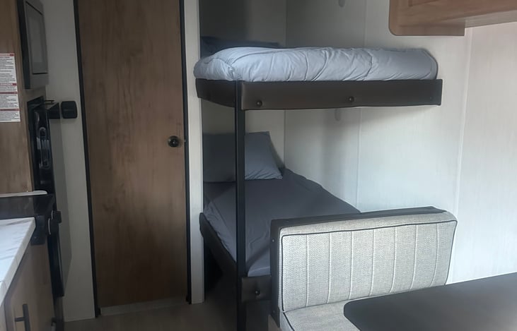 Bunk beds. Fully equipped with bedding and ample storage below.