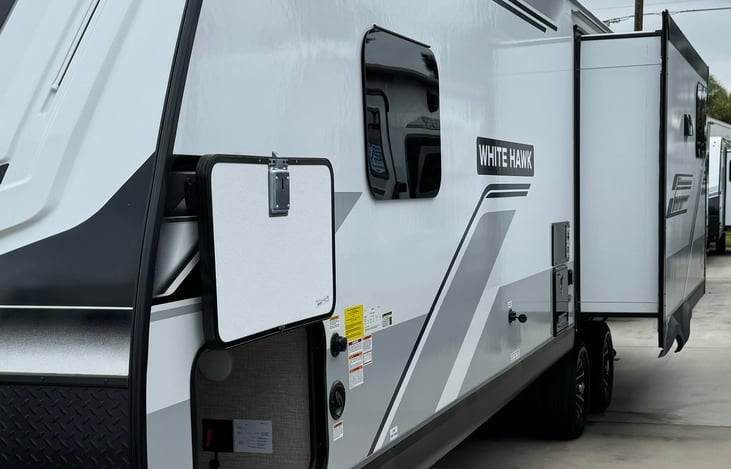 Driver side storage and slide