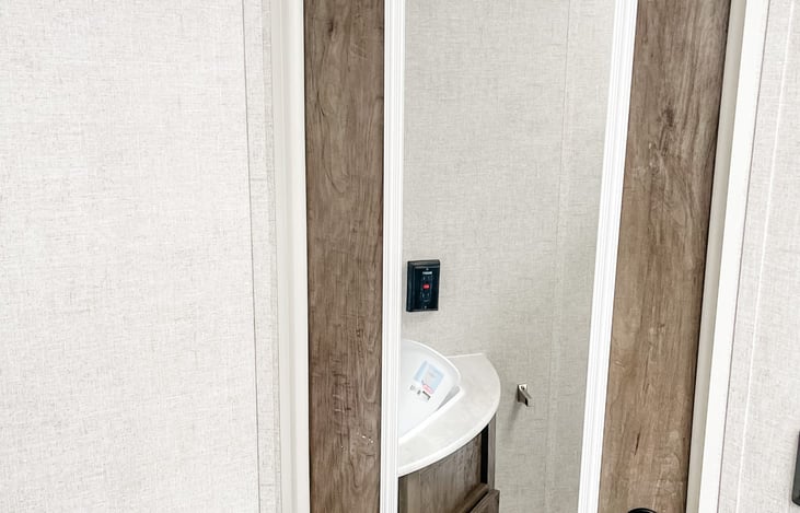 Full length mirror in bathroom